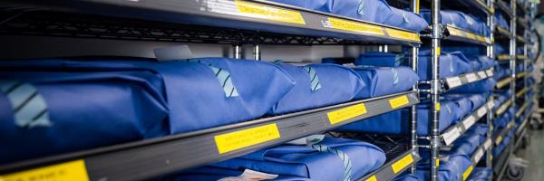 surgical instruments wrapped on shelves 